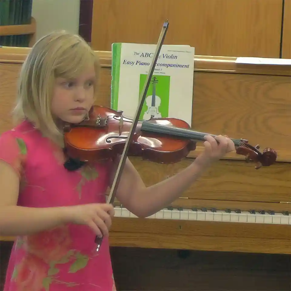Kasia's Daughter Playing Violin